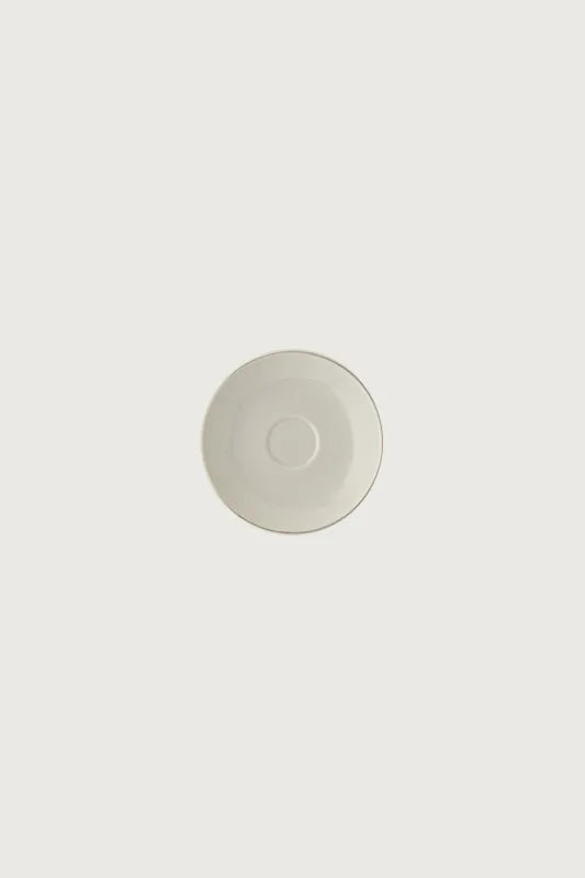 Alessi — Mami Gold SG69/77 | Sottotazza caffè porcellana e oro 18k — design italiano Alessi