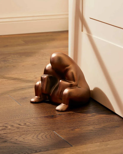 Alessi — Dédé PS18 BM | Fermaporta in resina con finitura Brown Metal — vista principale