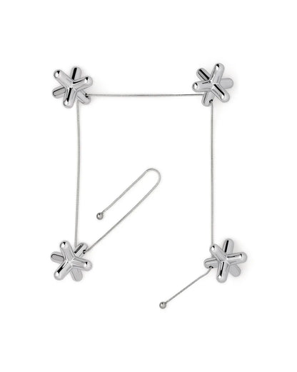 Alessi — Tripod GCH01 | Sottopentola in zama cromata — dettaglio
