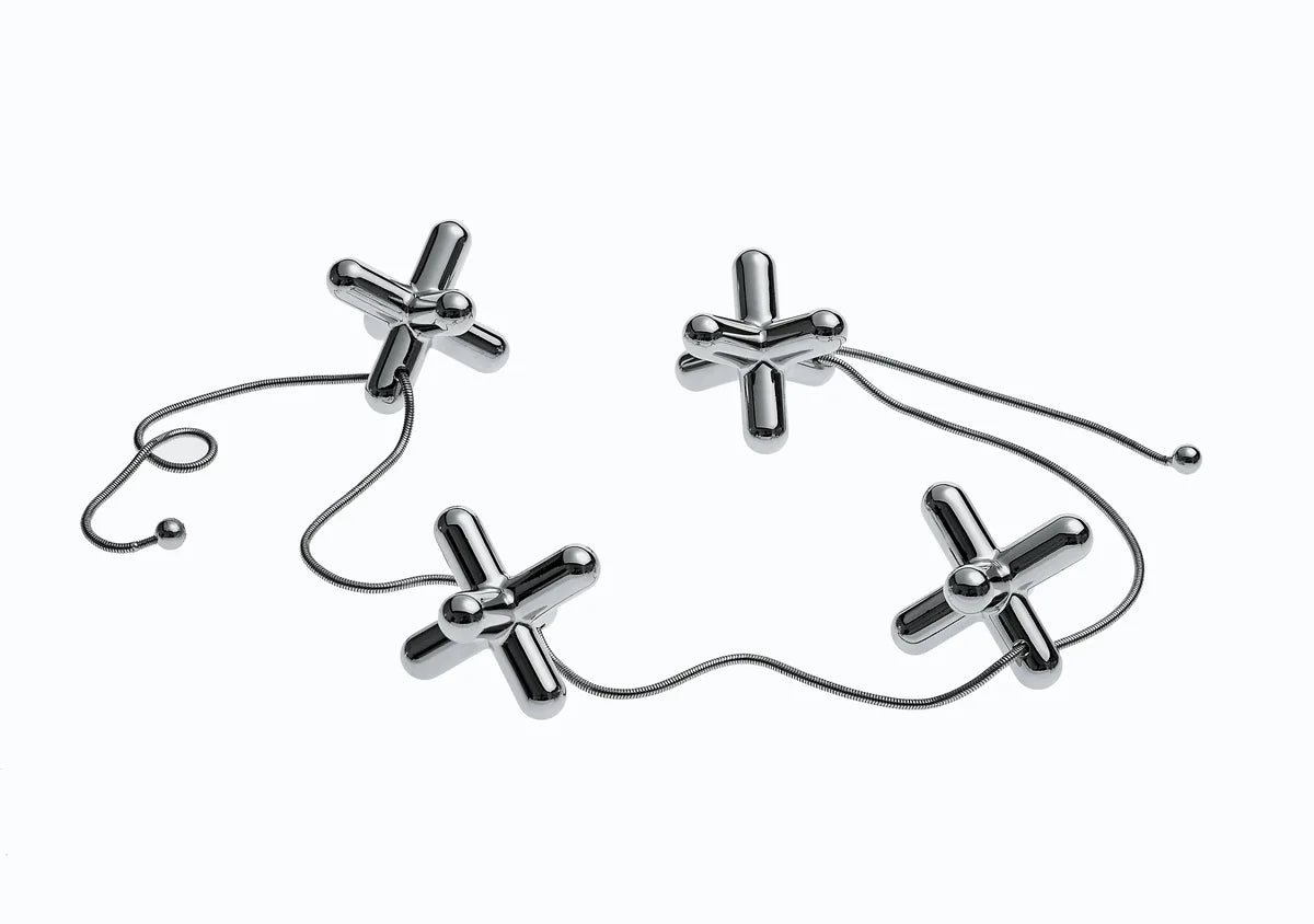 Alessi — Tripod GCH01 | Sottopentola in zama cromata — vista laterale