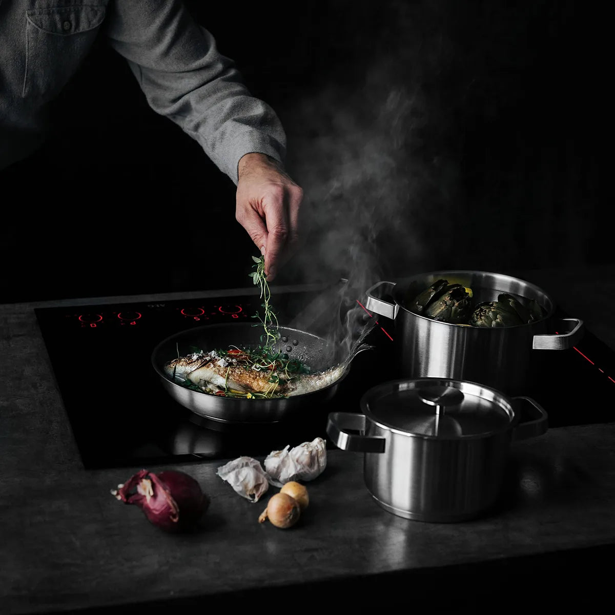 AEG Set 3 Padelle e Pentole acciaio inox antiaderente con manico ergonomico