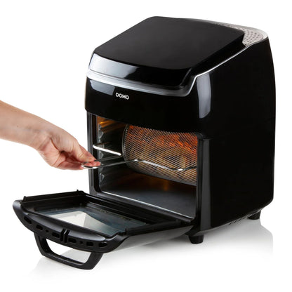 Domo friggitrice ad aria con cestello girevole nero, corpo termoisolato e display LED
