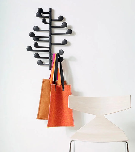 Arper Song appendiabiti a parete con bracci girevoli a forma di nota musicale, design pop moderno