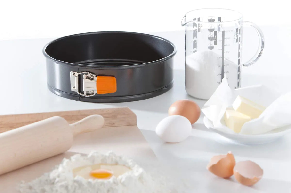 Le Creuset tortiera rotonda apribile acciaio al carbonio antiaderente con impugnatura silicone