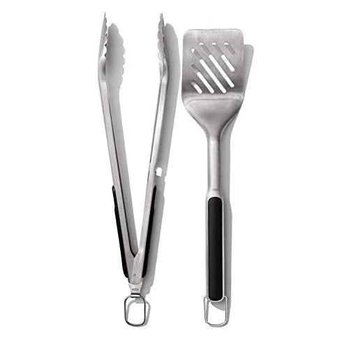 OXO Pinze Good Grips in acciaio inox con estremità frastagliate e apribottiglie integrato